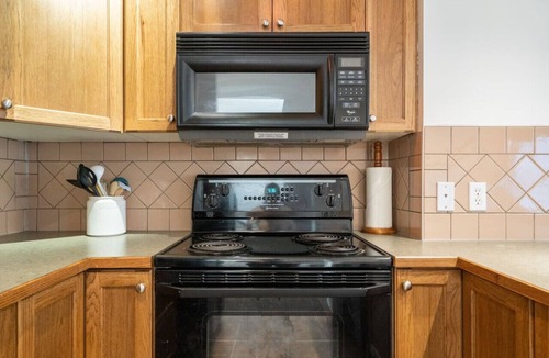 Radium Hot Springs Apartment | Misty Mountain Retreat | Pool/Hot Tub | Fireplace