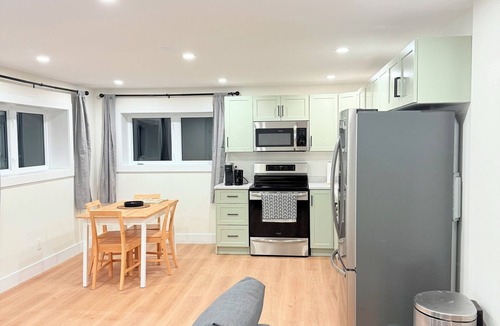 Terra Nova Apartment | Modern 1BR Close to Major Shopping & Amenities