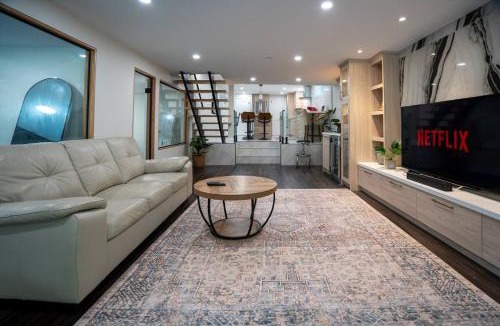 Seven Oaks Apartment | Modern 3BR Basement Retreat with Workspace & Parking