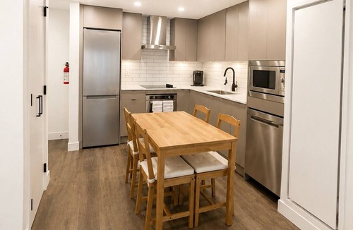 Kelowna Central Business District Apartment | Modern Downtown Retreat