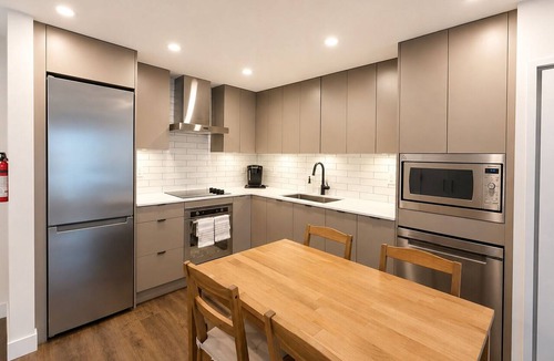 Kelowna Central Business District Apartment | Modern Downtown Retreat