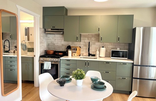 Golden Hotel | Modern Downtown Suite - Walking Distance to Restaurants, Shops, & Grocery Stores
