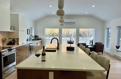 Steady Brook House | Modern luxury retreat on the Humber River, 5-minute walk from Marble Mountain!