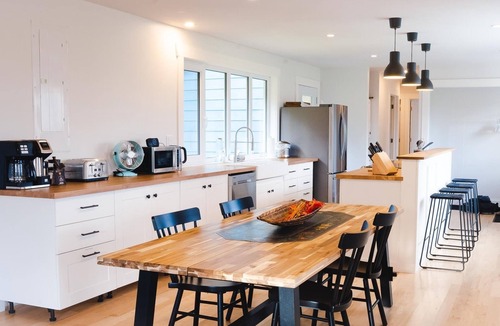 Margaree Forks House | Modern style home with spectacular views of the Margaree River.