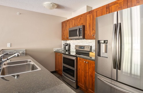 Panorama Condo | MVP Rentals. Top Floor Penthouse! Prime Location!