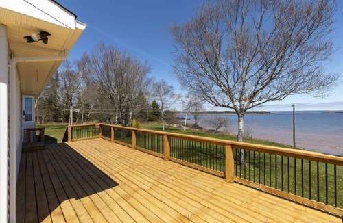 Saint John House | Oceanfront Bungalow on the Bay. 3 Bed 2 Bath with a large treed lot.