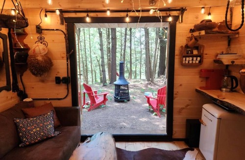 Bracebridge House | `Oda` Log Cabin with Cedar Hot Tub & Sauna on wood