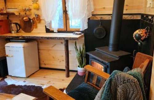 Bracebridge House | `Oda` Log Cabin with Cedar Hot Tub & Sauna on wood