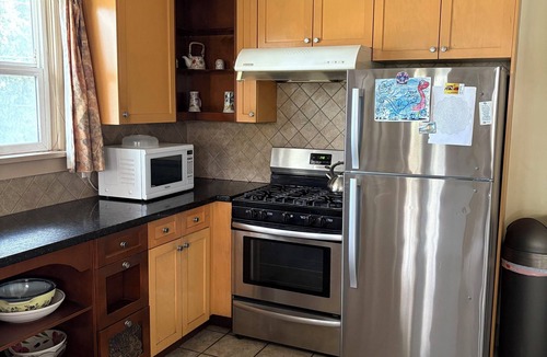 Marpole House | Older 3 bedroom home, fully furnished, two minutes to Marine gateway skytrain