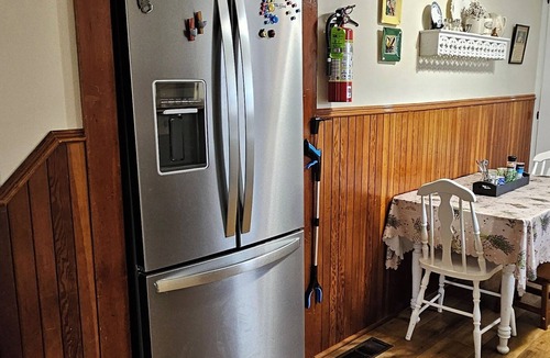 Saint Peters Bay House | PEI country farmhouse with a water view, close to beaches & is pet friendly.