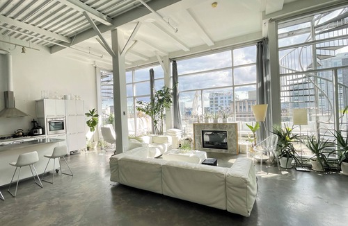 Gastown Condo | Penthouse loft with deck, rooftop and fireplace in historic Gastown, Vancouver.