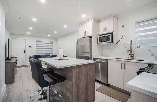 Surrey Newton Apartment | Private 1BR Suite near KPU, SMH , Restaurants, mall with free wifi & parking !