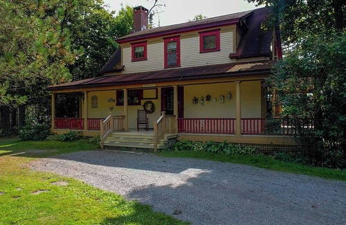 Saint Patrick Cottage | Private 2 Bedroom Historic Home with Fireplace & Fenced Yard. Pet-Friendly!