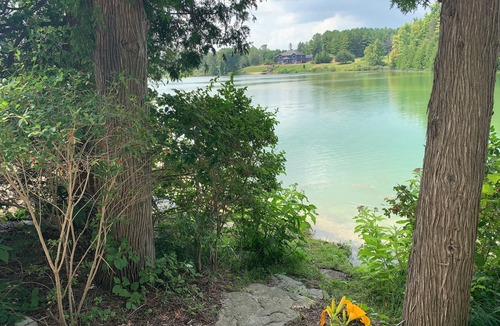Brockton Cottage | Private Family Lakefront Cottage with Sandy Beach and Sunset Views