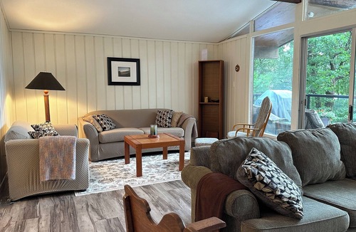 Georgian Bay Cottage | Renovated water front cottage w/firepit, multi level decks & screened in porch.