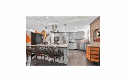 Paris House | Riverfront Estate in Paris, 5 luxury Suites indoor pool hot tub self serve spa