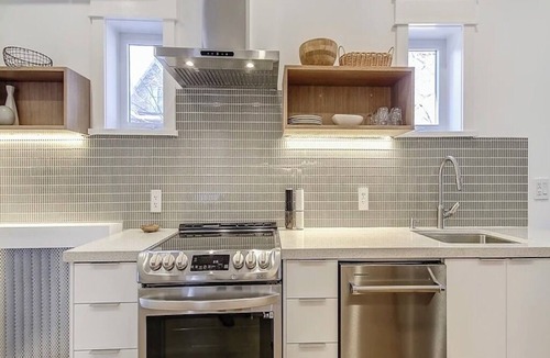 Roncesvalles Village Apartment | Roncesvalles Lush Green Retreat, Spa Bath & Patio