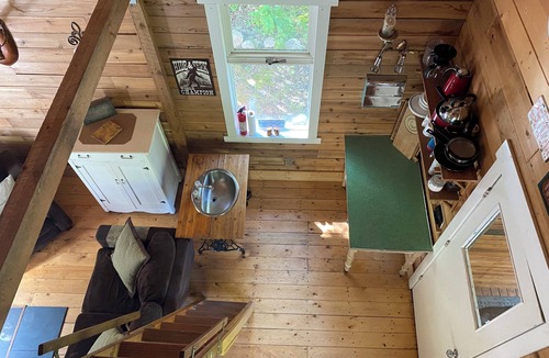 Mara Cabin | Rustic Solar cabin in the woods off grid glamming at its finest near Mara lake