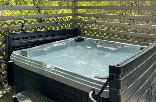 Saint Patrick RV Rental | Safari Glamping Tent! Forest Retreat & Hot Tubs!