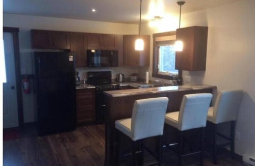 Rocky Harbour House | Single Bedroom Green Bungalow