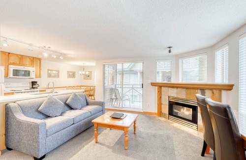 Village North House | Skier's dream townhouse with hot tub, balcony & fireplace - walk to lifts