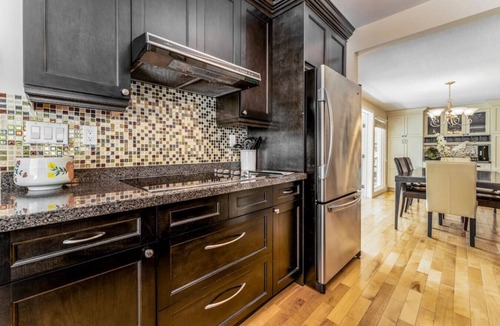 Windermere House | SPACIOUS 5 Br + 5 Br | Private HEATED Pool & Hot Tub | 1-minute WALK to Beach