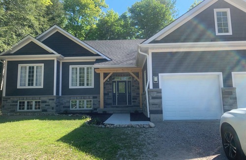 Lafontaine House | Spacious & Modern Bungalow on Cul-de-Sac: Large Deck, Wood Lot, Steps to Beach
