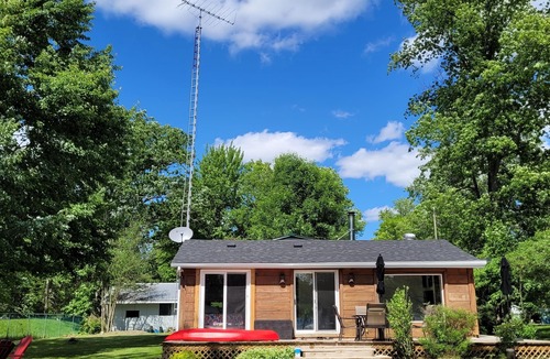Campbellford Cottage | Start each morning on the porch with warm sunshine and beautiful waterfront view