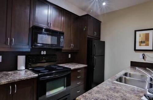 West Fernie Condo | Steam Room & Gym/Hot Tub/Mountain Views