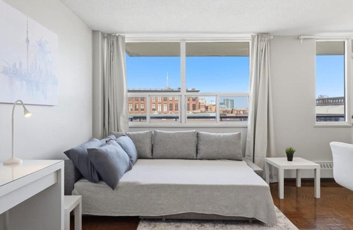 Parkdale House | Stylish 2BR condo with 2 Balconies & Workspace