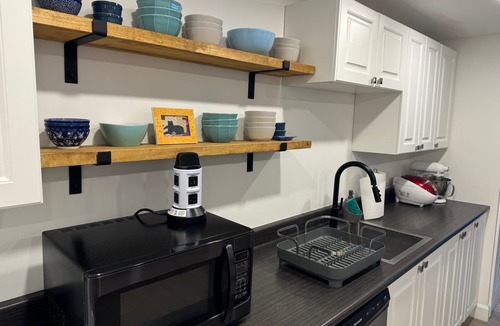 Hudson Apartment | Sunny, 1000-ft basement flat, parking, walkout patio entrance CITQ#305792