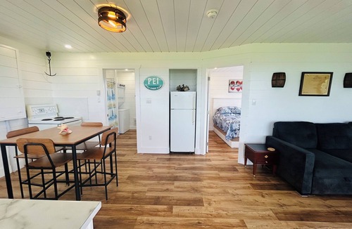 Malpeque Cottage | The Blue Buoy- Hot tub, King bed, Centrally located, stunning views.