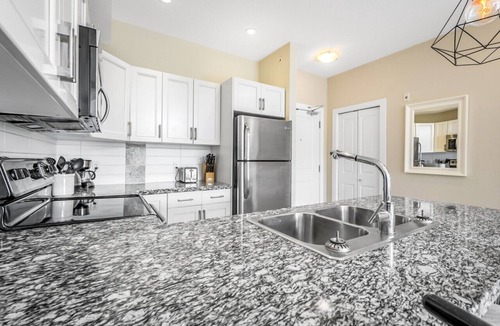 Central Okanagan Apartment | Top Floor Condo at Amenity Rich Resort! #406