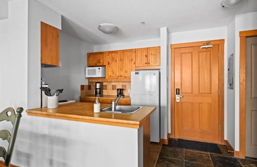 Panorama Condo | Top Floor in the HEART of Panorama Village | TRUE Ski In/Out | Pools & Hot Tubs
