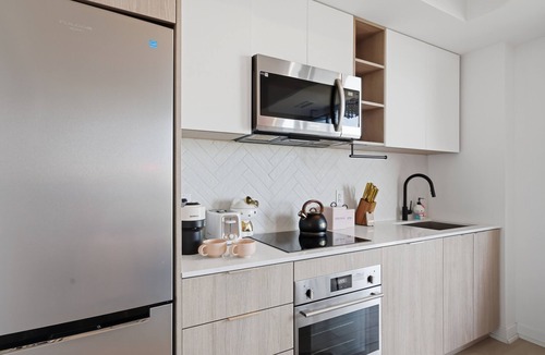 The Queensway Condo | Toronto Skyline View Condo with Parking, Sauna & Gym