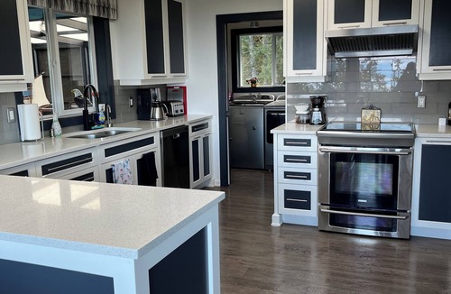 Regional District of Nanaimo House | Tree house in Nanoose Bay. Above the trees take in spectacular coastal views!
