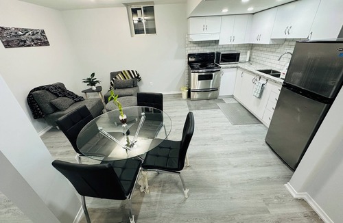 Erin Mills House | Two bedroom cozy bsmt home in prime location including parking & laundry room!