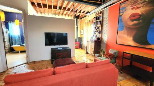 Little Portugal House | Unique Above Garage Loft