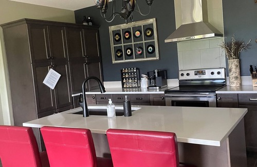 Alpine Trails Apartment | Walk out basement suite at the base of Tecumseh Mountain on 3 acres.