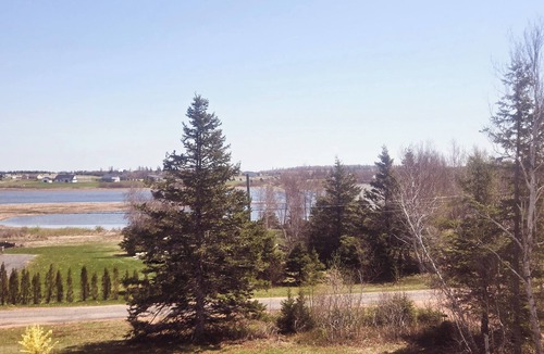 Brackley Beach House | Water view, king bed, 3 min. to beach, near downtown, full kitchen, pet friendly