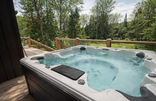 Bracebridge House | Waterfront Muskoka Cottage with Hot Tub, Canoes, Fire Pit and BBQ