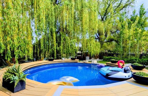 South Pandosy House | Waterfront Oasis with Pool, Hot Tub & Pet Friendly