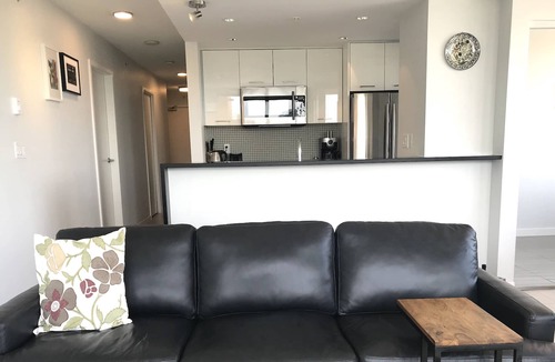 Southeast False Creek Condo | Welcome home to this beautifully furnished apartment in trendy Yaletown!