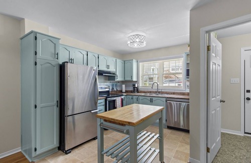 Downtown St. John's House | Welcome to The Crossing, a thoughtfully restored 3-bedroom home on a quiet residential street in historic St. John's. Enjoy free off-street parking, a private fenced yard, and all the comforts of home—just minutes from the best of St. John's.