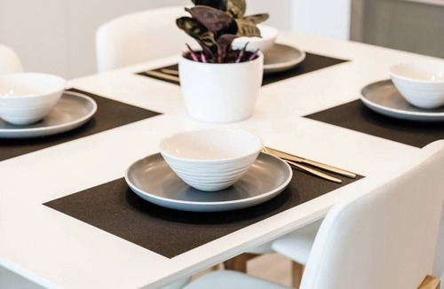 Downtown Kelowna Condo | Welcome to The New Yorker! A stylish downtown Kelowna retreat with lake views, a rooftop terrace, and walkable access to restaurants, shops, beaches, and the waterfront.