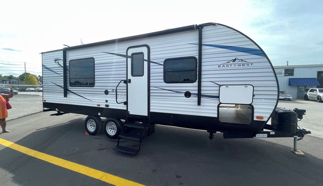 2019 East to West Della Terra 25 Foot Travel Trailer on a rural property
