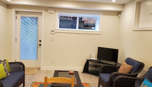 Basement legal suite with 2 beds and 1 full bathroom with laundry and kitchen