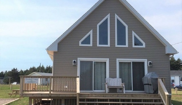 Beach House across from Wild Harbour Beach with Spectacular Ocean View!