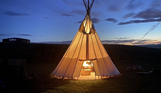 Blackfoot Tipi Lodging under the Prairie Sky.