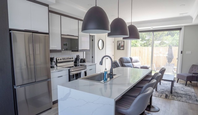 Bridgeview Point South- Designer Home in the Perfect Location with Balcony Views